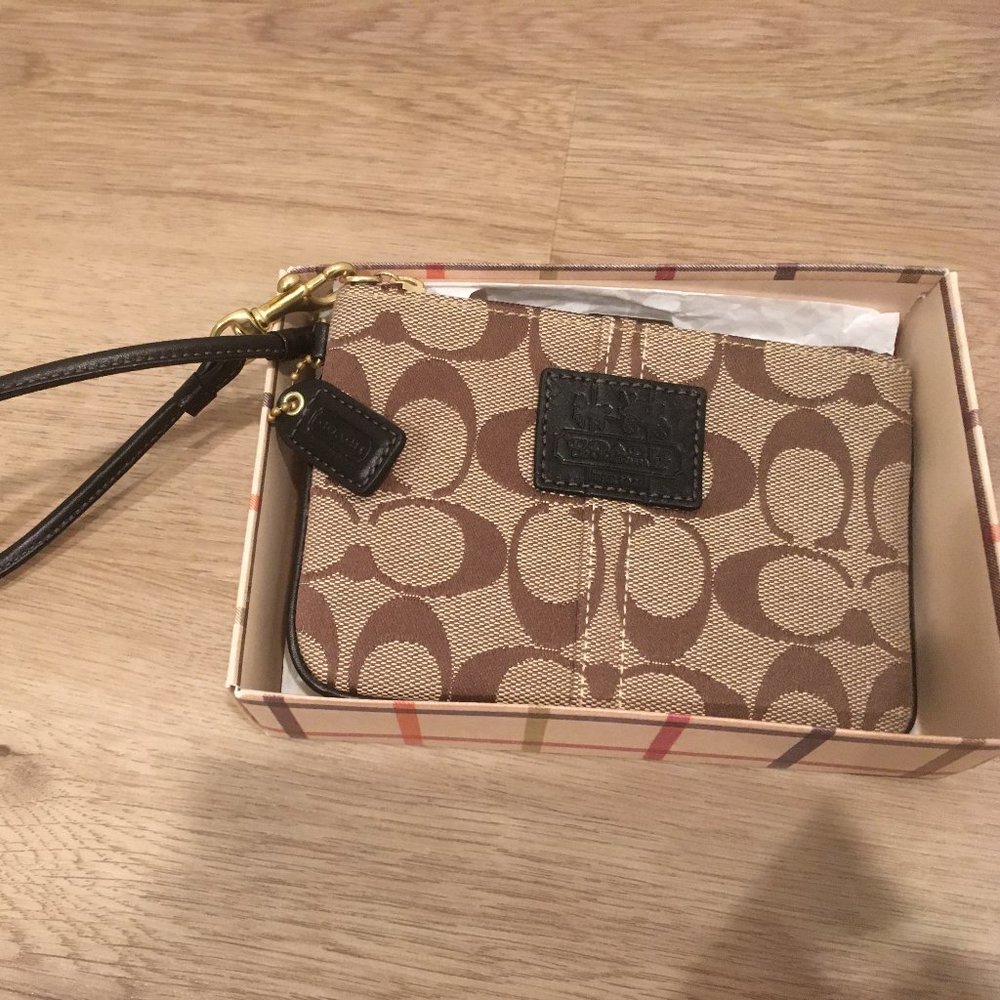 NWT Coach signature wristlet in gift box